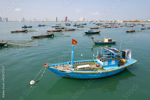Traditional Vietnamese fishing boats in Da Nang bay on sunny day. Vietnam.