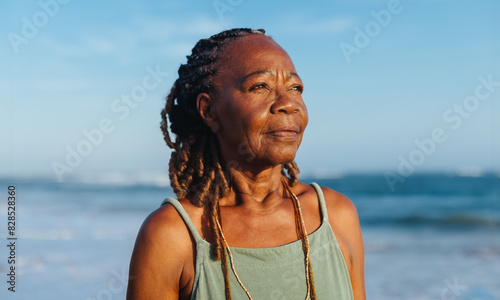 Photos Serene moment with an older African American woman at the beach