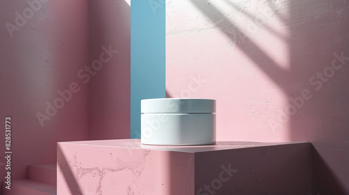 A white container is sitting on a pink and blue platform