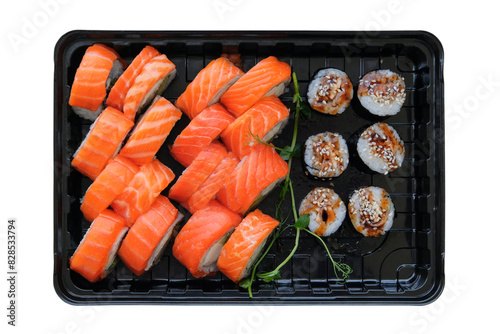 Sushi set in black box isolated on white background. Japanese sushi, philadelphia rolls. Takeaway. Top view.