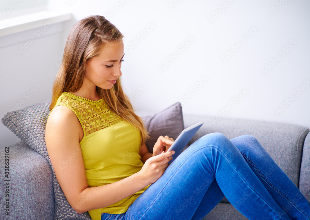 Woman, tablet and typing on sofa in living room for social media or streaming entertainment at home. Happy female, blogging on lounge or couch for browsing, scrolling or searching on technology Woman, tablet and typing on sofa in living room for social media or streaming entertainment at home. Happy female, blogging on lounge or couch for browsing, scrolling or searching on technology