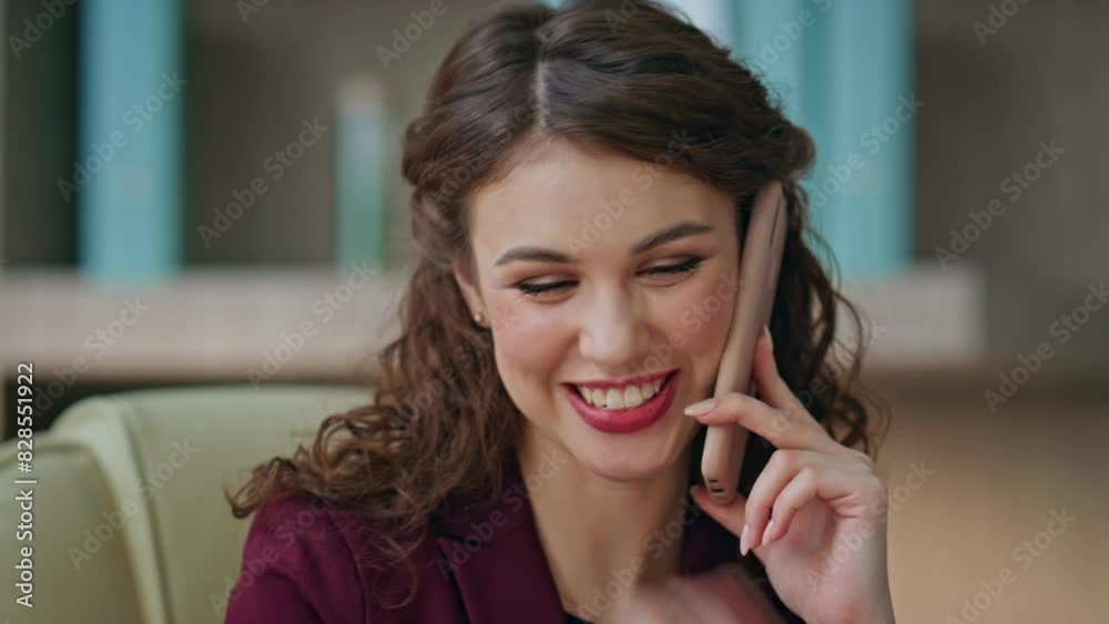 Happy manager speaking smartphone at workplace closeup. Smiling office woman Happy manager speaking smartphone at workplace closeup. Smiling office woman