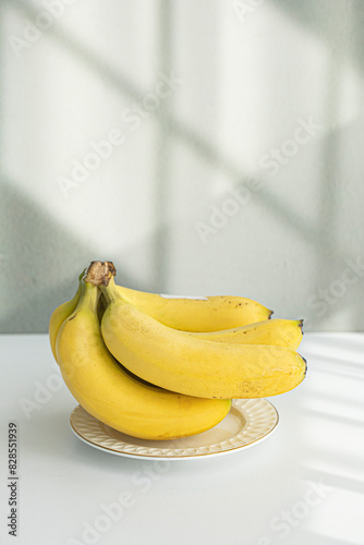 Fresh ripe bananas bunch isolated on white background