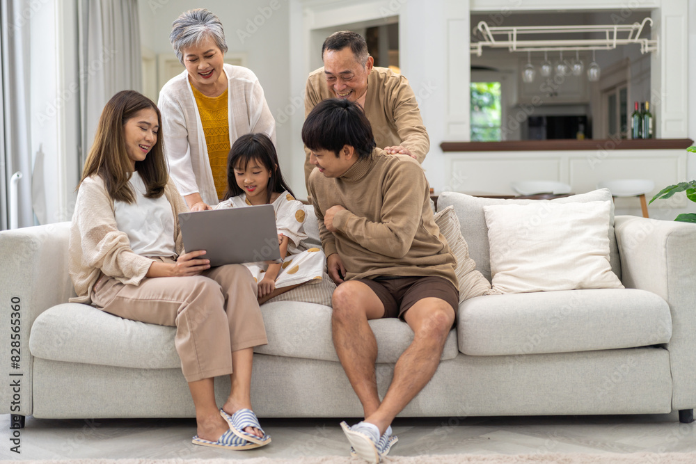 Father and mother with asian kid girl learn on laptop computer reviewing lesson study with online education e-learning.student look for educational knowledge in homeschool at home.Education Father and mother with asian kid girl learn on laptop computer reviewing lesson study with online education e-learning.student look for educational knowledge in homeschool at home.Education