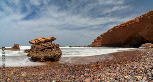 panorama landscape view of the beach and rock arch at Legzira on the Atlantic Coast of Morocco