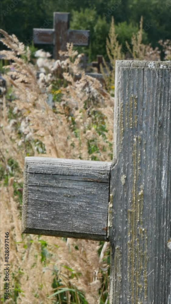 Old Wooden Cross in Cemetery. Slider Shot. Vertical.
