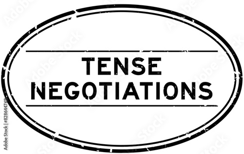 Grunge black tense negotiations word oval rubber seal stamp on white background