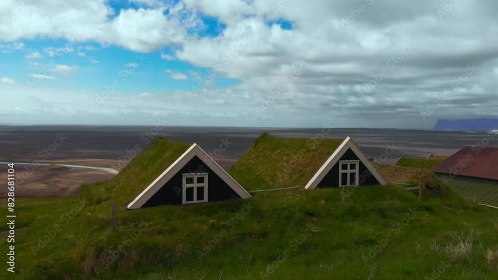 Traditional Icelandic houses with grass on the roof drone video Traditional Icelandic houses with grass on the roof drone video