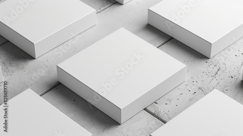 A white square is placed on a gray surface