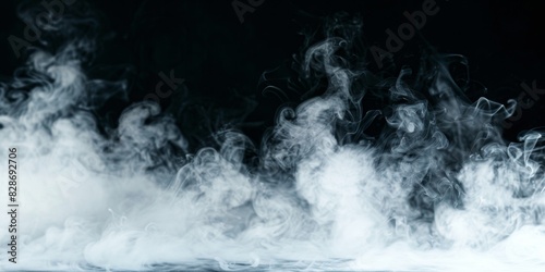 white smoke at bottom with black background