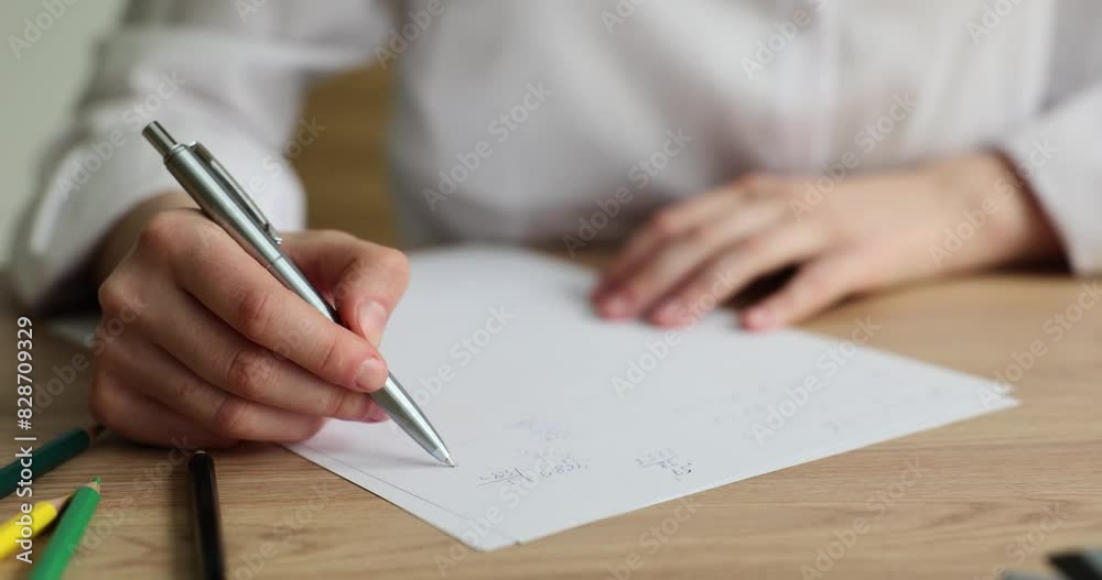 Recording math exercises student solves problem closeup. Higher mathematics for students Recording math exercises student solves problem closeup. Higher mathematics for students