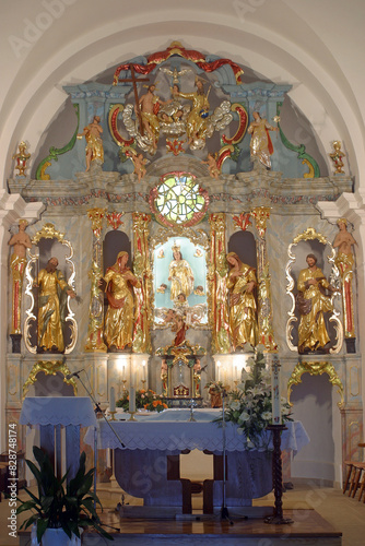 High altar in the parish church of the Assumption of the Virgin Mary in Brezovica, Croatia photo