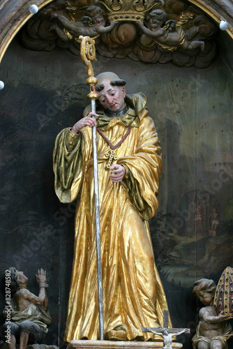 Saint Leonard of Noblac statue on main altar in the church Leonard of Noblac in Kotari, Croatia photo