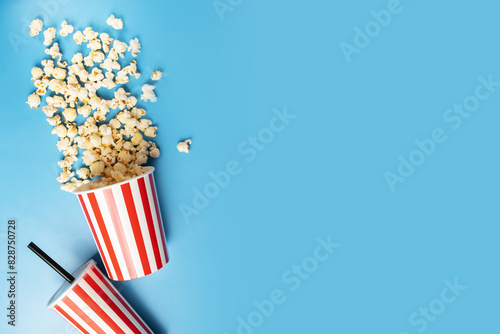 Film popcorn bucket with soda cup, entertainment show beverage choice