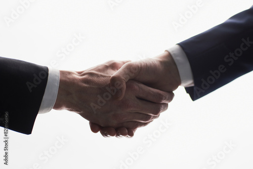 Business handshake - Hand holding on white background