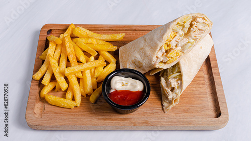 Canvas Print French fries and durum doner kebab