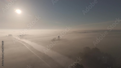 Dokkumer Ee river: Aerial View of Friesland Farmland in Morning Mist photo