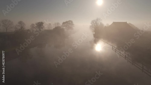 Morning Mist over Dokkumer Ee River, Friesland: Aerial View photo