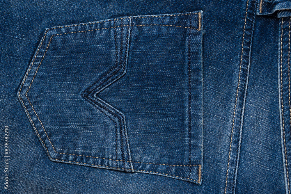 Fototapeta premium Blue jeans denim texture as a background. Top view.