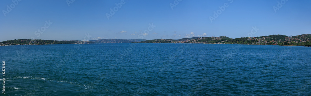 Turquoise blue sea water. View of the Bosphorus in Istanbul city on sunny summer day, in a public place. Turquoise blue sea water. View of the Bosphorus in Istanbul city on sunny summer day, in a public place.