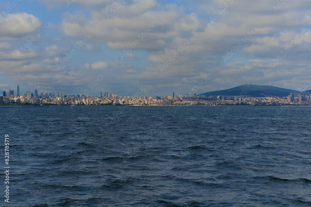 Turquoise blue sea water. View of the Bosphorus in Istanbul city on sunny summer day, in a public place. Turquoise blue sea water. View of the Bosphorus in Istanbul city on sunny summer day, in a public place.