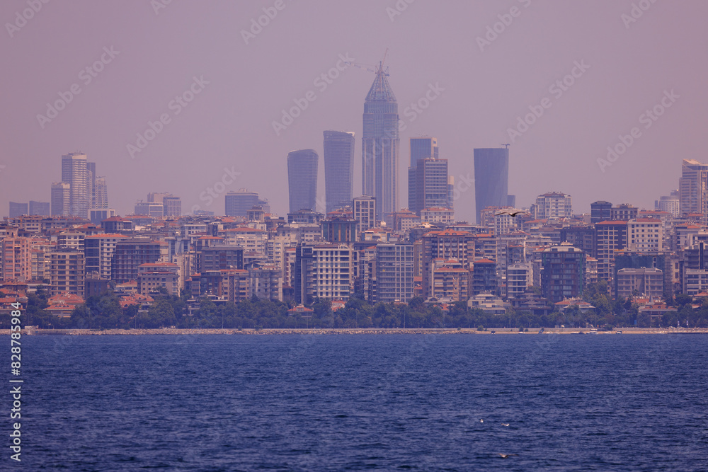 Obraz premium Evening sea view off the coast of Istanbul. Orange sunset sky 