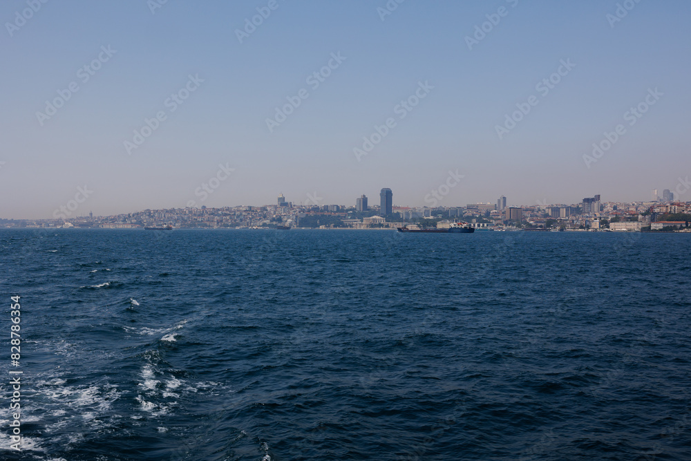 Turquoise blue sea water. View of the Bosphorus in Istanbul city on sunny summer day, in a public place. Turquoise blue sea water. View of the Bosphorus in Istanbul city on sunny summer day, in a public place.
