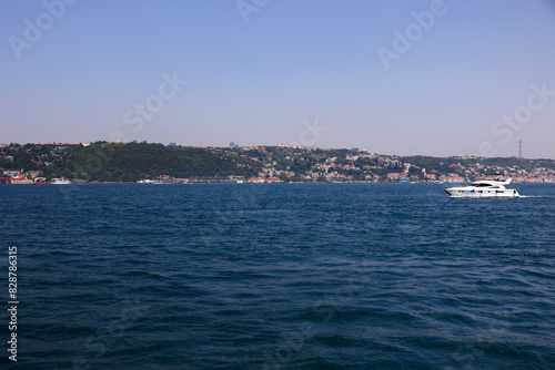 Turquoise blue sea water. View of the Bosphorus in Istanbul city on sunny summer day, in a public place.