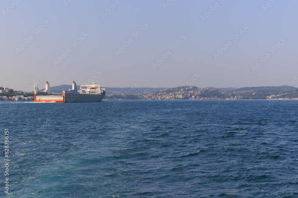 Turquoise blue sea water. View of the Bosphorus in Istanbul city on sunny summer day, in a public place.