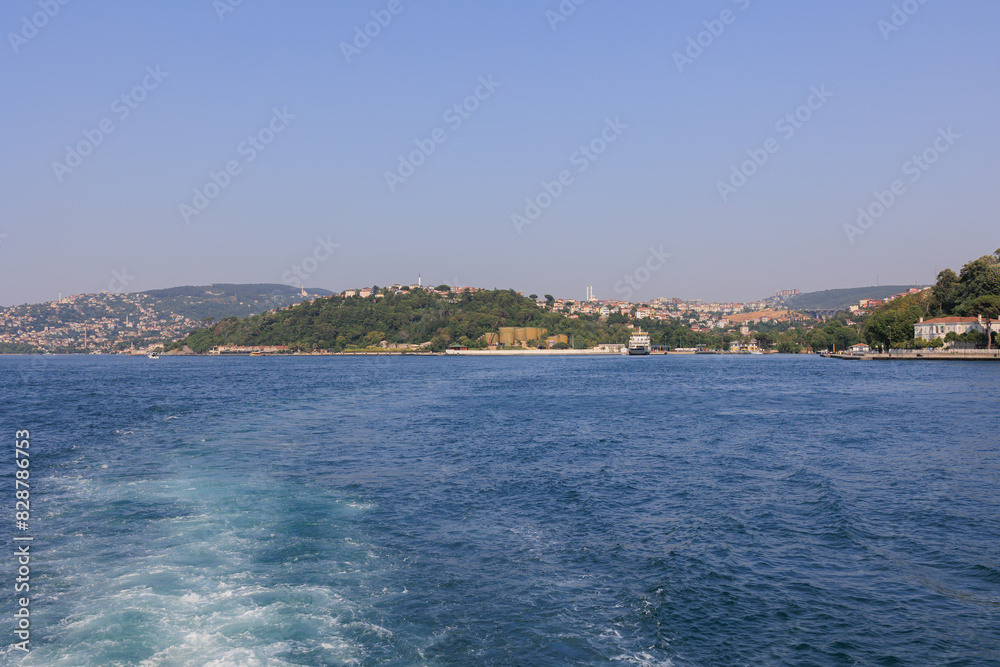 Turquoise blue sea water. View of the Bosphorus in Istanbul city on sunny summer day, in a public place. Turquoise blue sea water. View of the Bosphorus in Istanbul city on sunny summer day, in a public place.