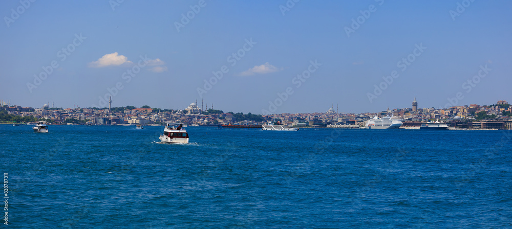Blue seascape overlooking the coast. View of the Bosphorus in Istanbul city on sunny summer day, in a public place. Blue seascape overlooking the coast. View of the Bosphorus in Istanbul city on sunny summer day, in a public place.