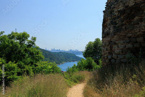 Fototapeta Naklejka Na Ścianę i Meble -  Beautiful road and landscape, streets and roads of a southern small town, public place in Turkey, on a summer sunny day