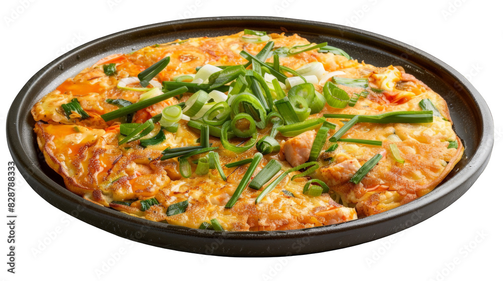 A delicious and savory omelet with green onions served on a black plate. A delicious and savory omelet with green onions served on a black plate.