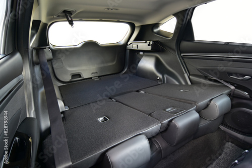 Trunk of car with rear seats folded, inside view