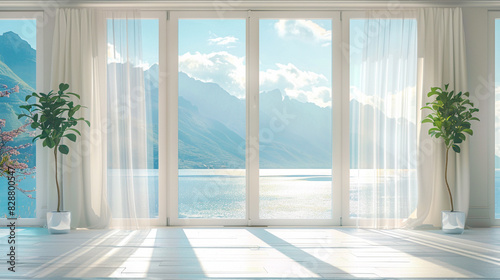 Large empty room with large floor-to-ceiling windows, view of the mountains from the window