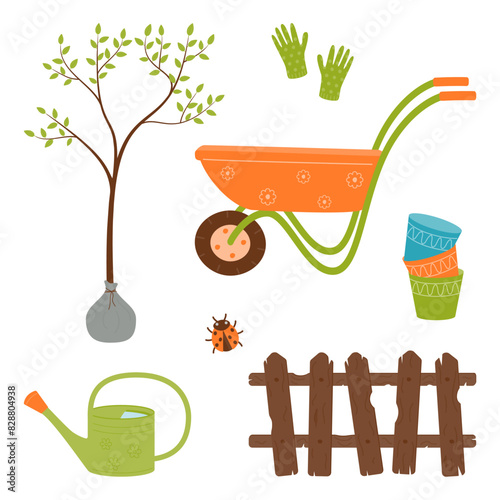 A set for gardening and planting plants - a garden wheelbarrow, a seedling, a watering can, gloves, a wooden fence, empty pots.