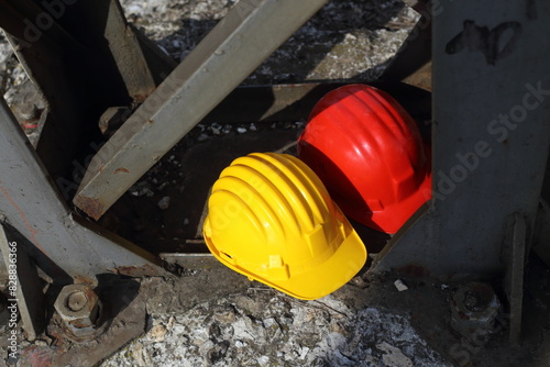  yellow and red helmets on a work site