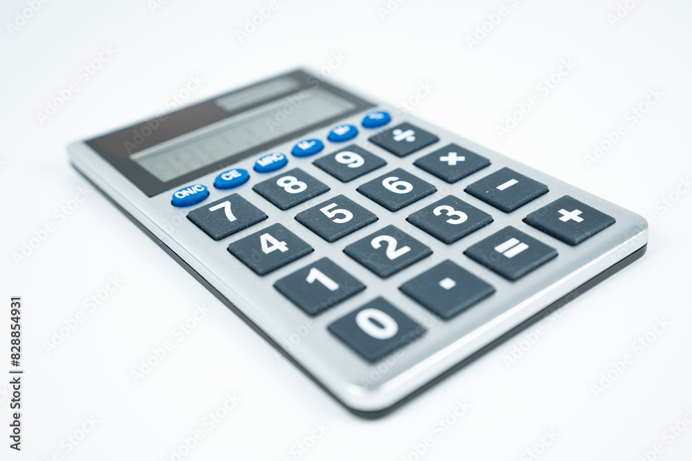 A Calulator Isolated On A White Background Angled From Left To Right A Calulator Isolated On A White Background Angled From Left To Right