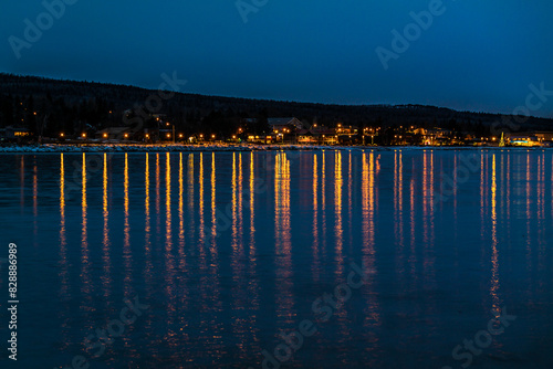 Small Town at Night with Lights Reflecting in the Bay