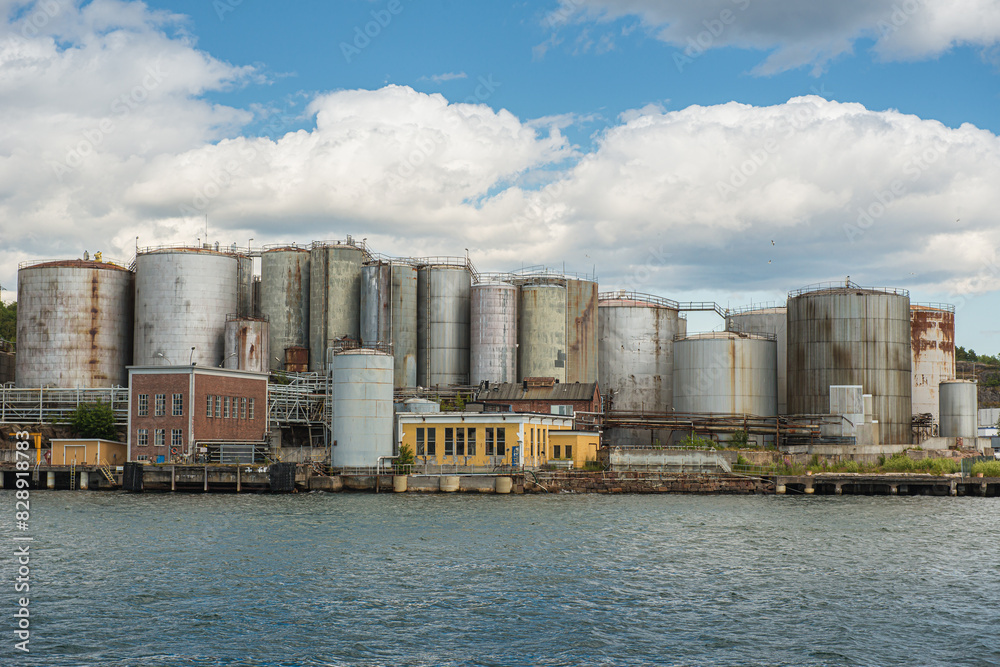 Industrial site containing a lot of tanks for storing chemicals. Industrial site containing a lot of tanks for storing chemicals.