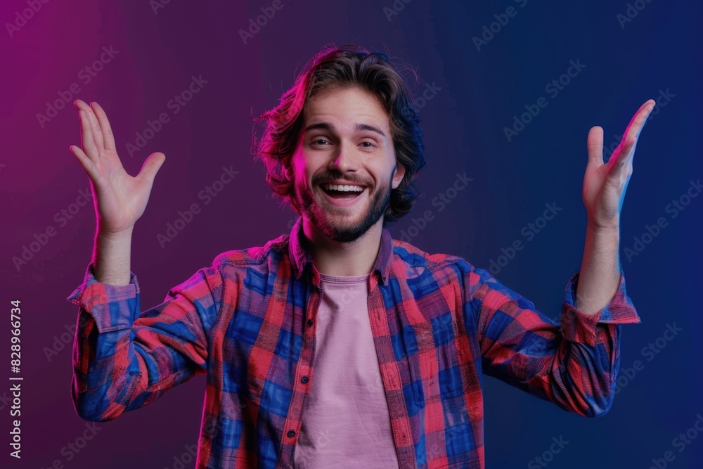 Cheerful guy with copy space in neon background portrait Cheerful guy with copy space in neon background portrait
