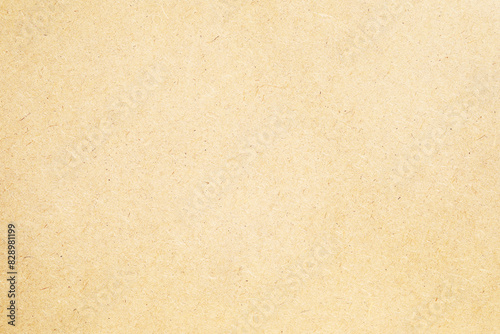 Brown crumpled paper with grains texture closeup