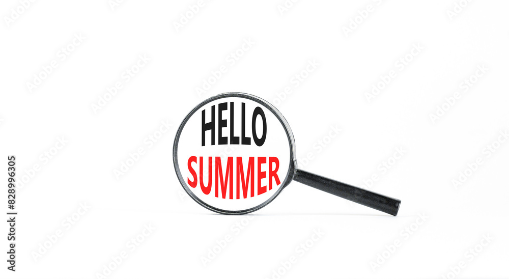 Hello summer symbol. Concept words Hello summer in beautiful magnifying glass. Beautiful white paper background. Business lifestyle Hello summer concept. Copy space. Hello summer symbol. Concept words Hello summer in beautiful magnifying glass. Beautiful white paper background. Business lifestyle Hello summer concept. Copy space.