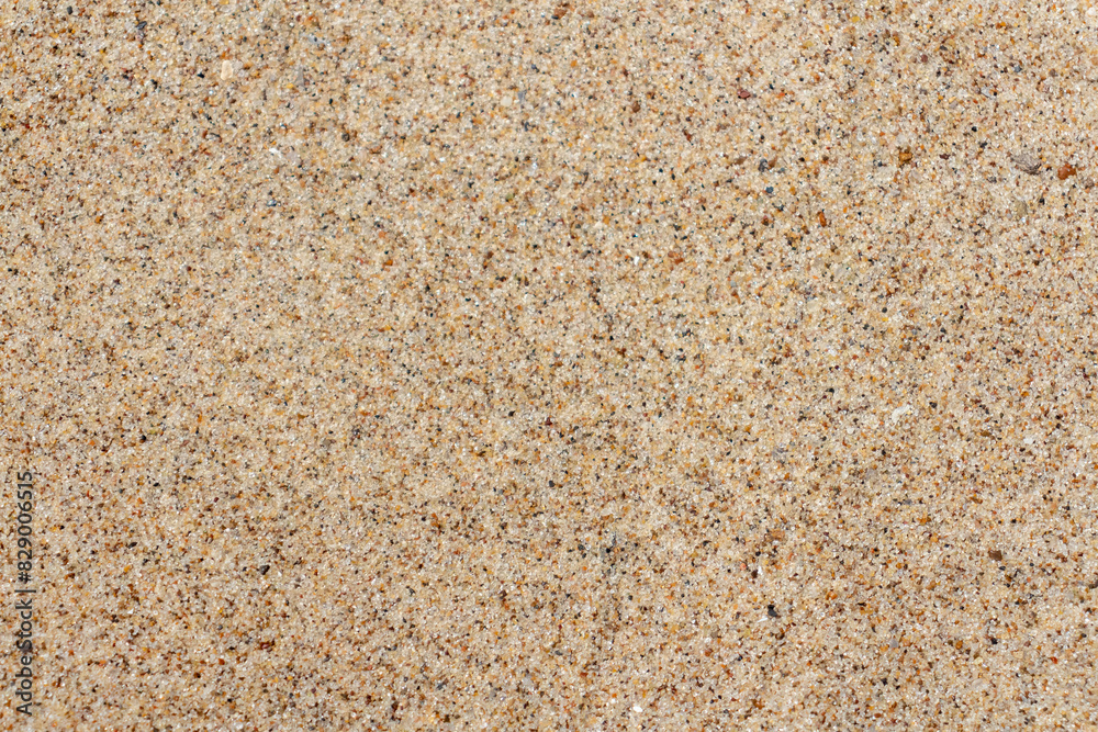 Close-up view of rough textured beige sand surface. Abstract construction material background. Soft focus. Copy space for your text or decoration. Sea travel theme. Close-up view of rough textured beige sand surface. Abstract construction material background. Soft focus. Copy space for your text or decoration. Sea travel theme.