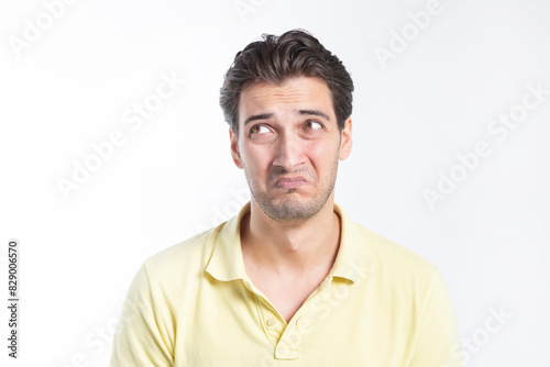 Close up portrait of unhappy stressed man isolated on white background