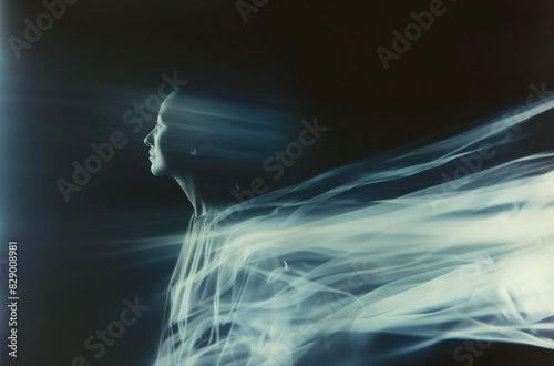 Ethereal portrait of a person wrapped in light trails creating motion blur  evoking a sense of speed and fluidity