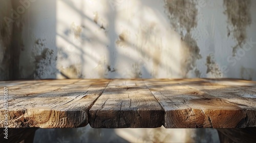 Wooden Table Against Wall © olegganko