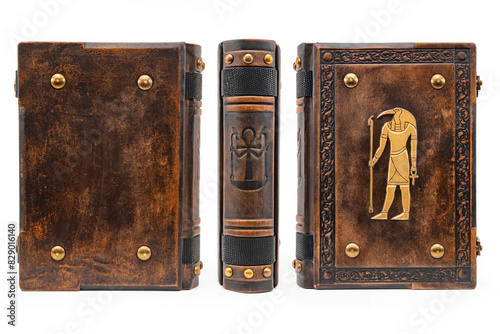 Worn brown leather book with ancient goddess Thoth on the cover. photo