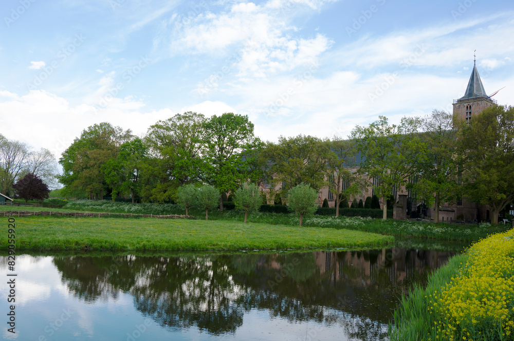Typical canal landscape in Netherlands Typical canal landscape in Netherlands