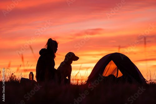 A girl with her dog near a tourist tent, travel, tourism with a pet photo